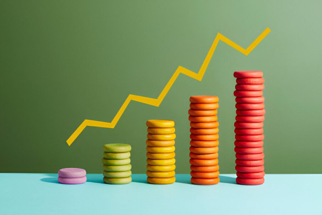 Coins arranged as a bar chart with a graph line above illustrating business growth and how to grow a business in 2026